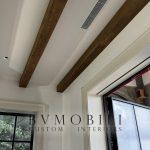 Handcrafted exposed timber beams with natural wood finish