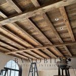 Reclaimed wood ceiling and custom exposed beam construction