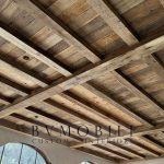 Architectural ceiling built with century-old reclaimed timber