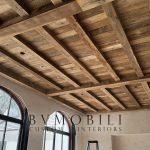 Exposed reclaimed oak beams and aged wood ceiling planks
